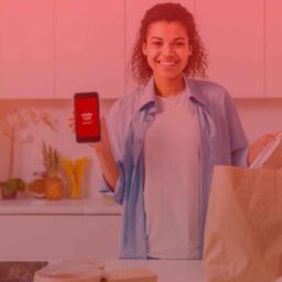 girl holding baskyt app & groceries